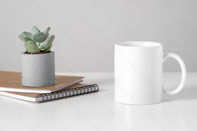 White Blank Mugs On A Table - Stock Photos