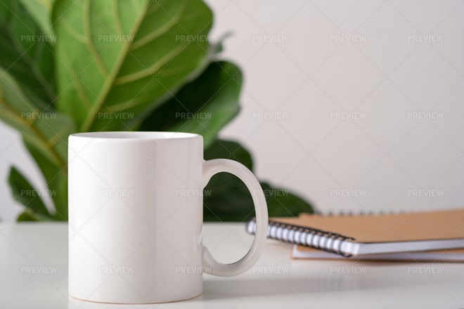 White Blank Mugs On A Table - Stock Photos