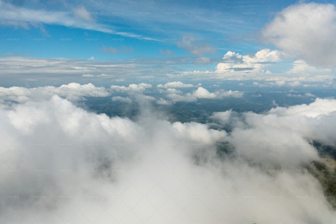 Top View Through Clouds - Stock Photos | Motion Array