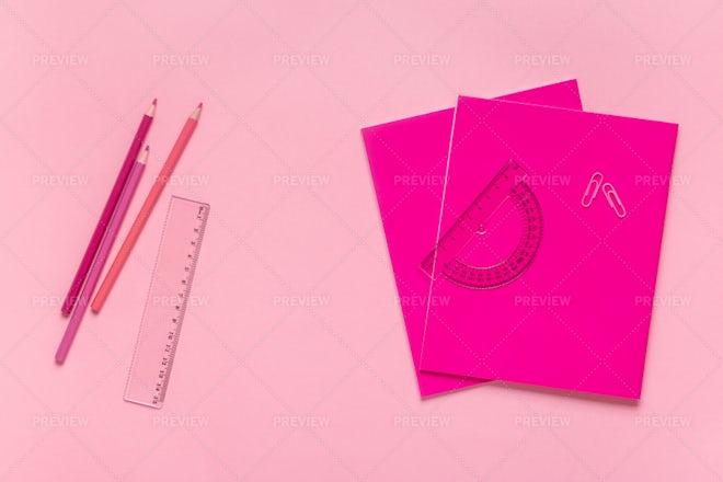 School equipment. Frame of school supplies on pink background. Flat lay.  Stock Photo