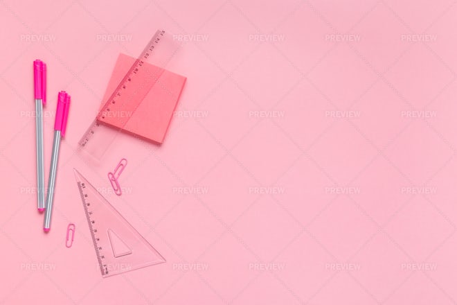 School equipment. Frame of school supplies on pink background. Flat lay.  Stock Photo