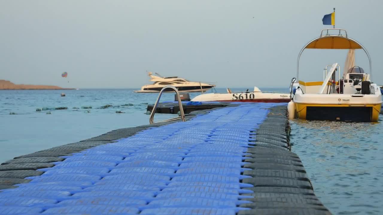 Powerboats Moored On Floating Jetty Stock Video Motion Array