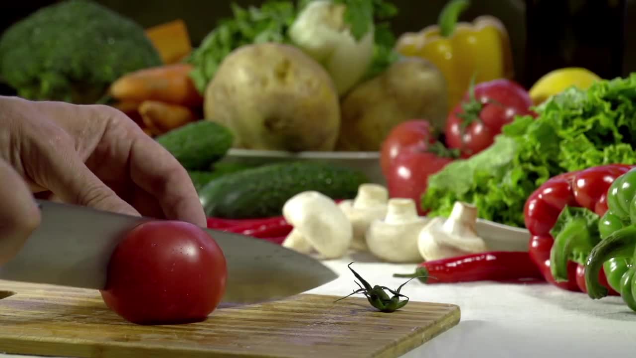 Knife Cutting Tomato Stock Video Motion Array