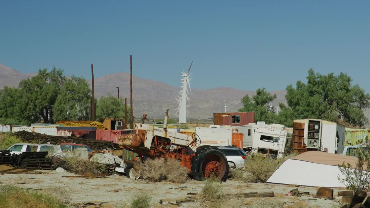 Junkyard Near Wind Turbines Stock Video Motion Array
