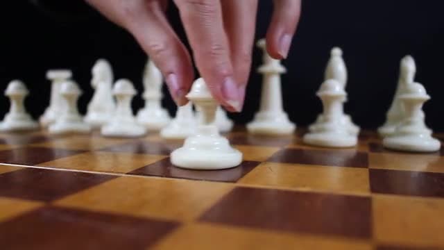 Arranging Chessboard Pieces: Stock Video