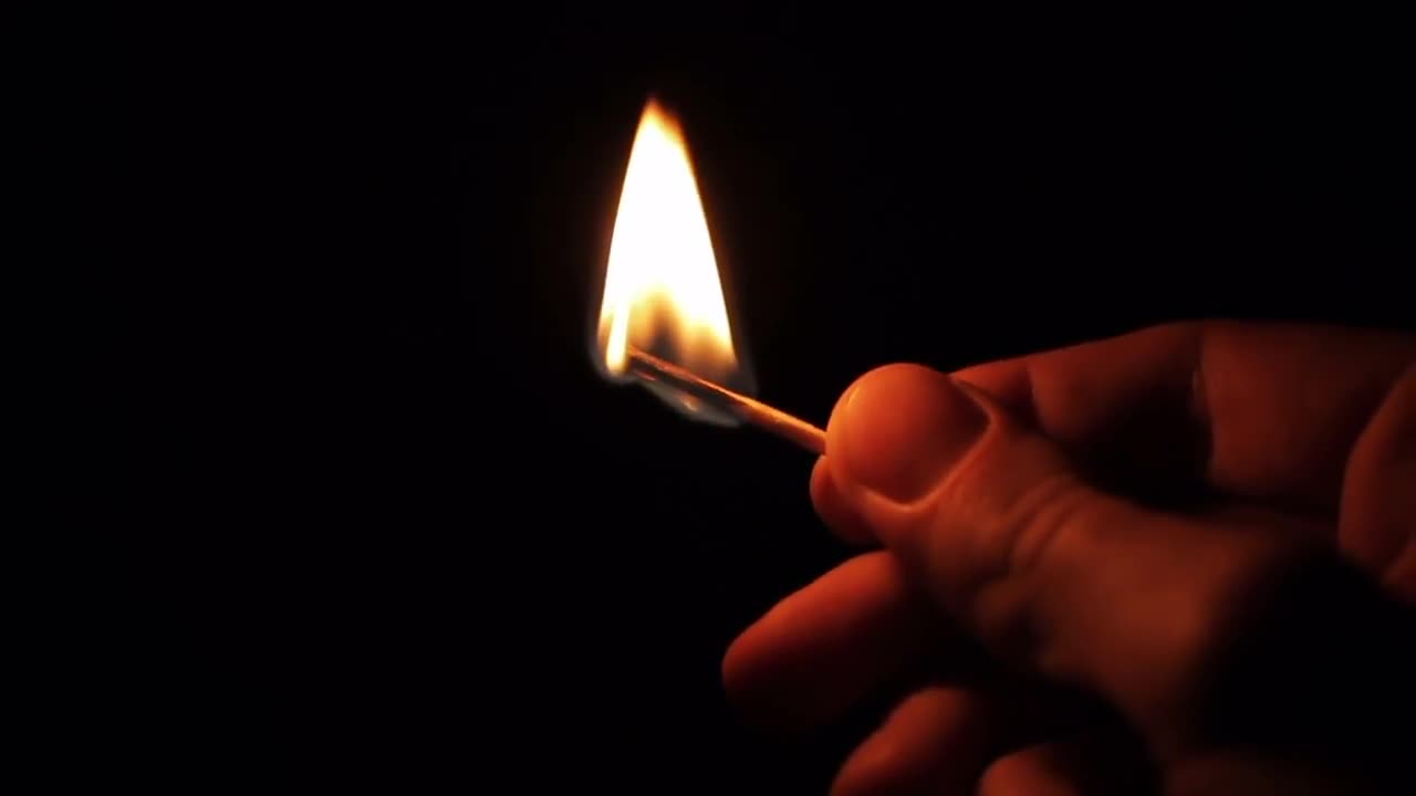 lighting-a-matchstick-stock-video-motion-array