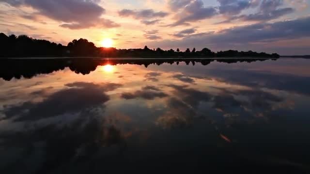 Sun Sets Over Lake: Stock Video