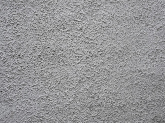 Small plaster wall texture background 