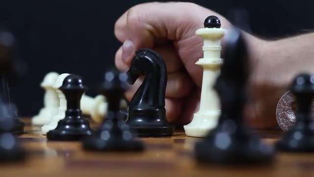 Punch On The Chessboard: Stock Video
