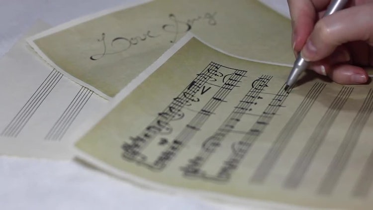 Woman Writing Music Notes: Stock Video