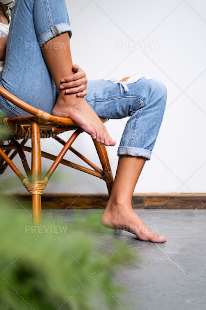 Barefoot Woman Relaxing In Comfy Chair - Stock Photos