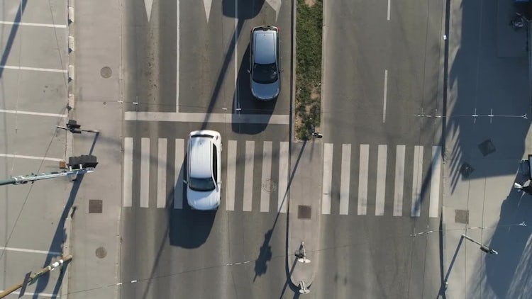 Vehicles Crossing Zebra Crossing: Stock Video