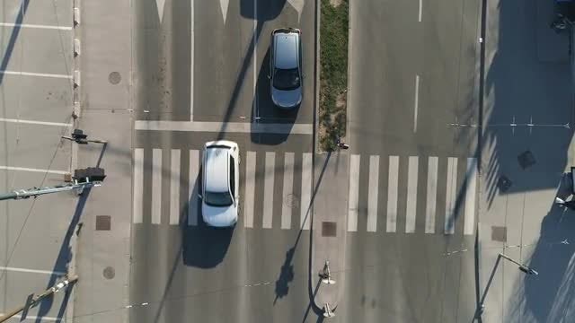 Vehicles Crossing Zebra Crossing: Stock Video