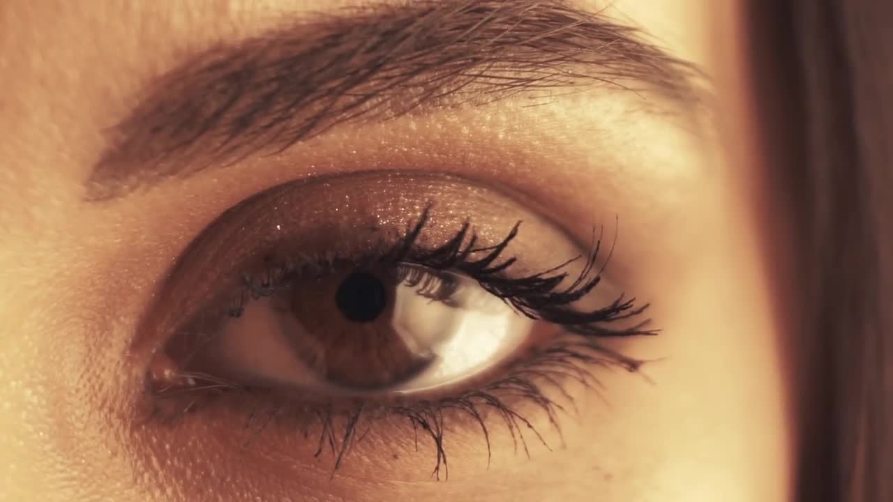 Woman`s Eye Blinking Stock Video Motion Array