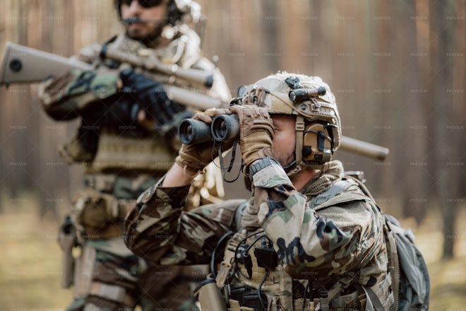 Soldier Looking Through Binoculars - Stock Photos | Motion Array