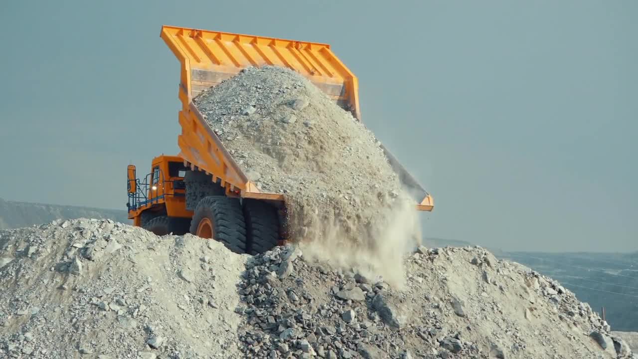 Truck Offloading Rocks - Stock Video | Motion Array