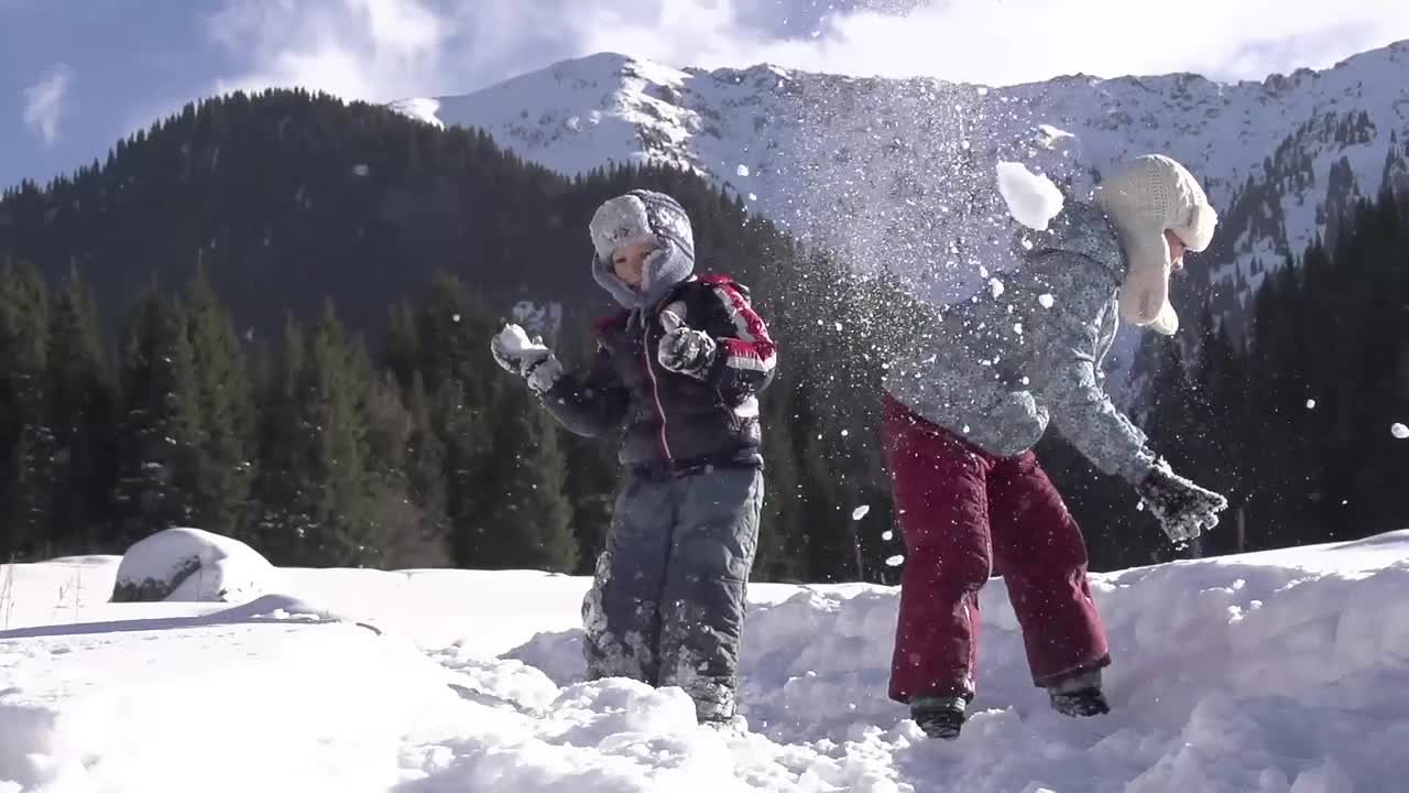 Throwing Snowballs - Stock Video | Motion Array