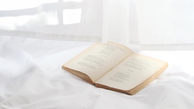 Open Book In Bedroom: Stock Video