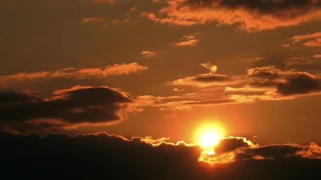 Sun Behind Dark Clouds: Stock Video