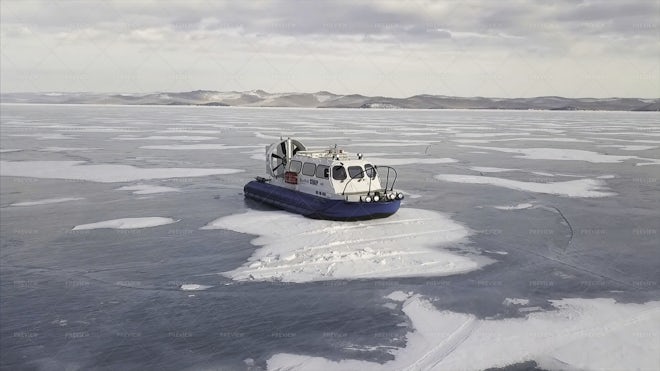 Hovercraft Sliding Across Siberian Lake - Stock Photos | Motion Array