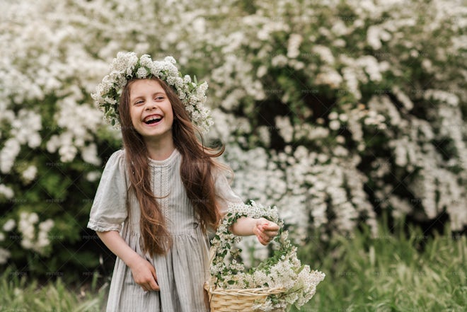 Girl Wearing Floral Wreath - Stock Photos 