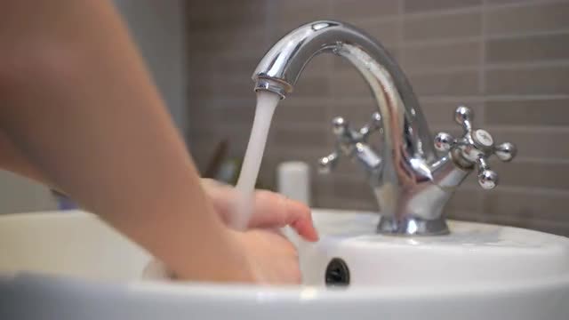 Girl Washes Her Hands: Stock Video