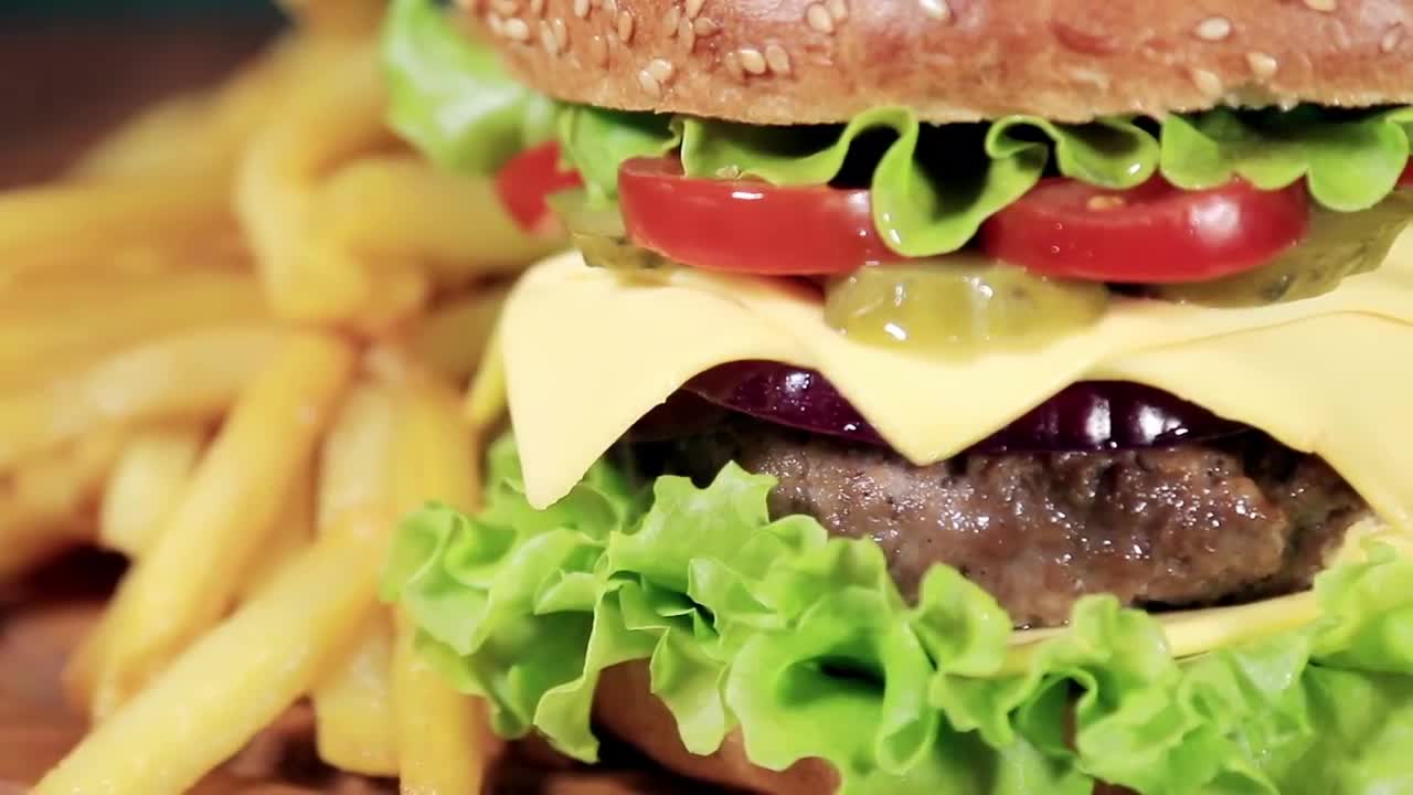 Burger With Fries - Stock Video | Motion Array