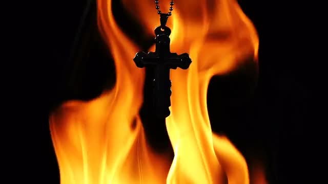 Crucifix And Hell Fire: Stock Video