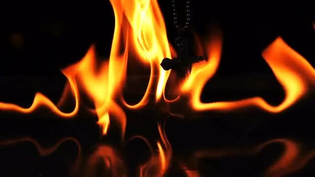 Crucifix Over Hell Fire: Stock Video