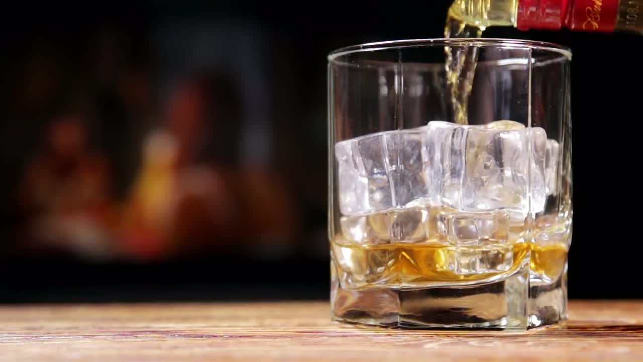 Pouring Whiskey Stock Video Motion Array