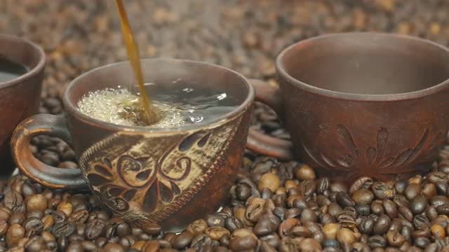 Coffee Poured Into Cups: Stock Video