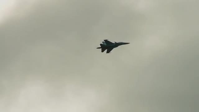 Fighter Jet On Cloudy Sky: Stock Video