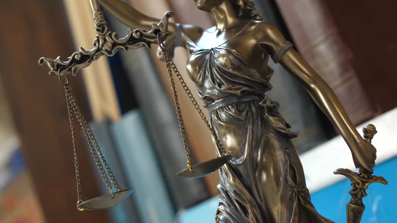 Lady Justice With Books - Stock Video | Motion Array