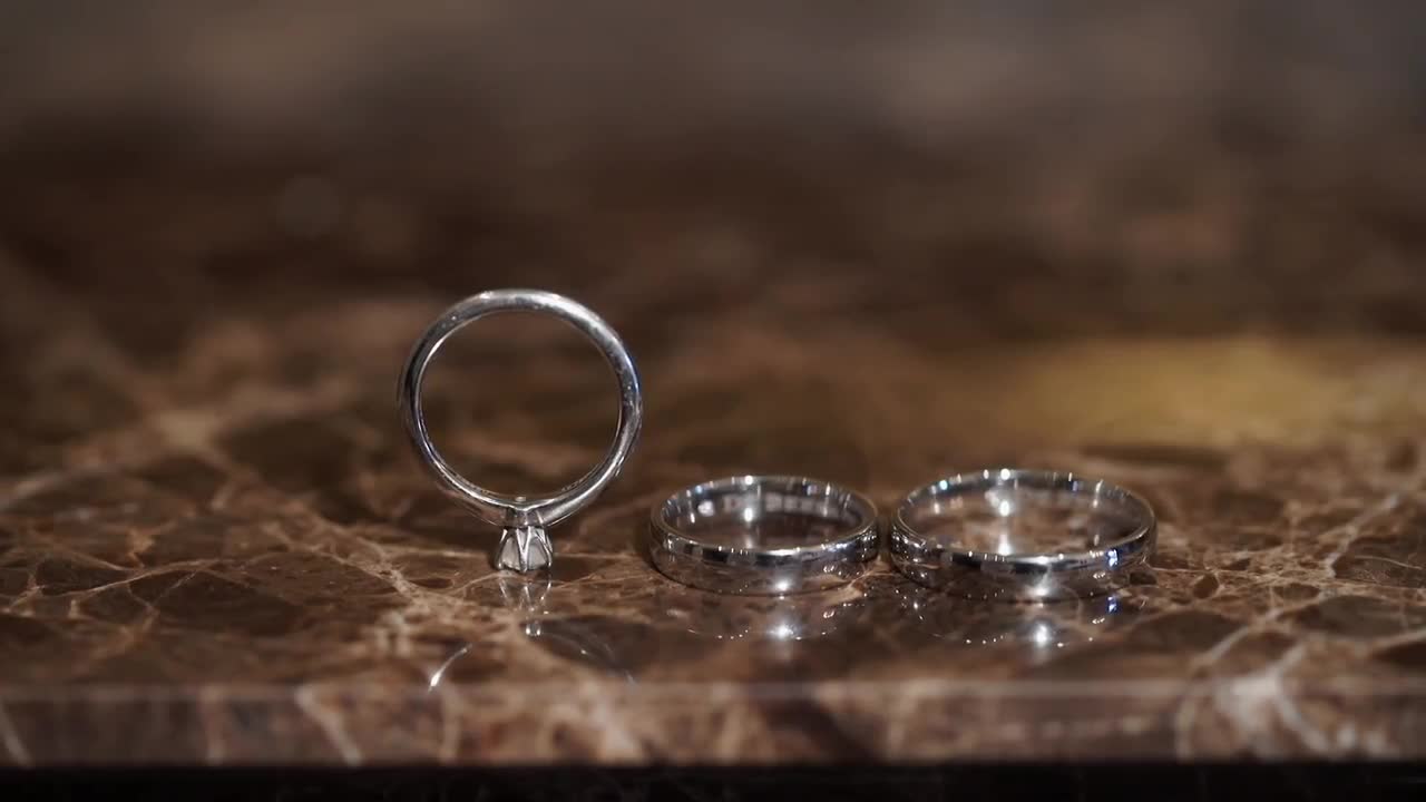 Wedding Rings On Table Stock Video Motion Array