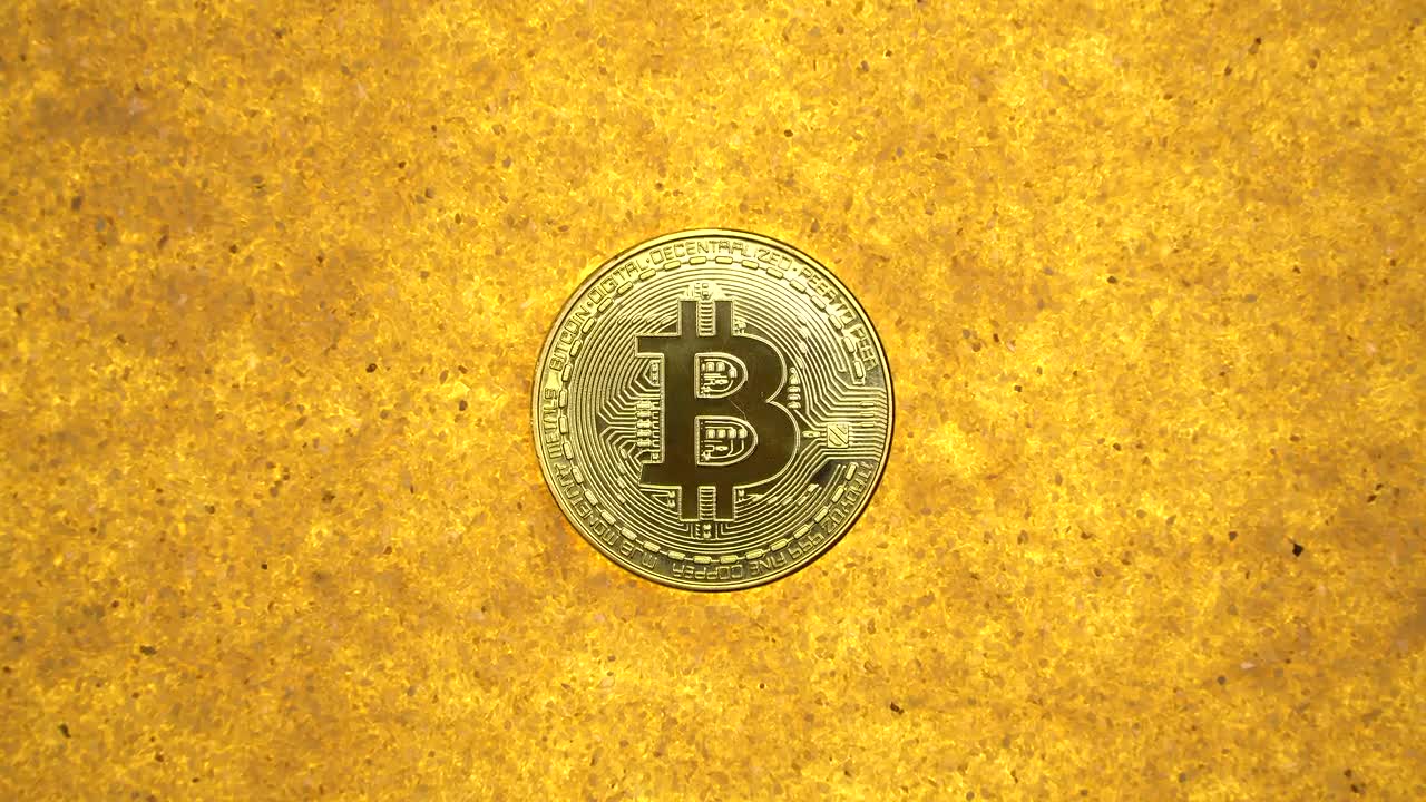 Bitcoin On Gold Background - Stock Video - Motion Array