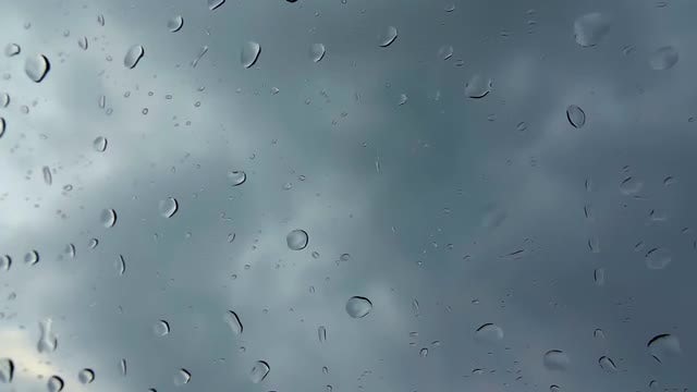 Rain Drops Onto Window: Stock Video