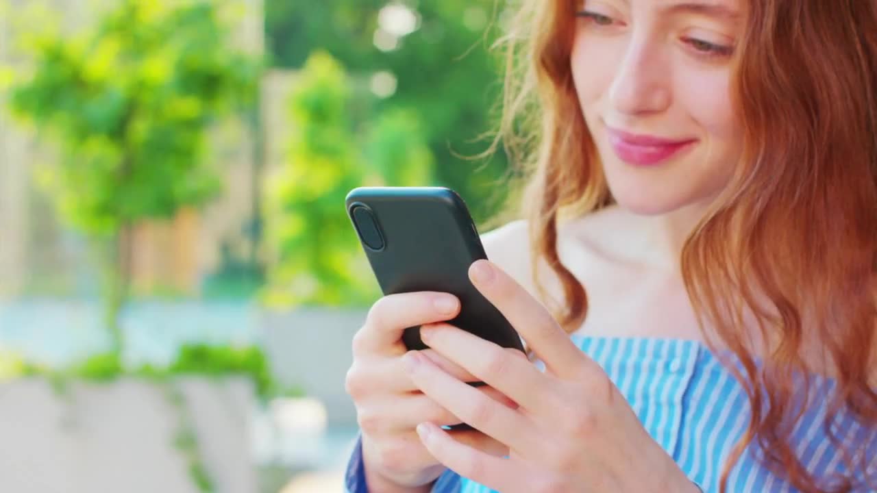 ༒ Girl Using A Smartphone - Stock Video | Motion Array