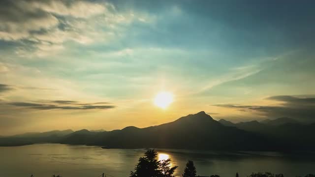 Lake Sunrise With Mountain And Clouds: Stock Video
