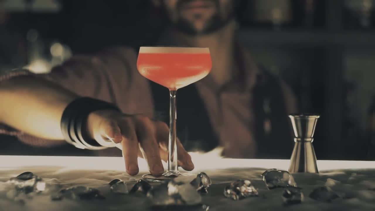 Bartender Serving A Drink - Stock Video | Motion Array