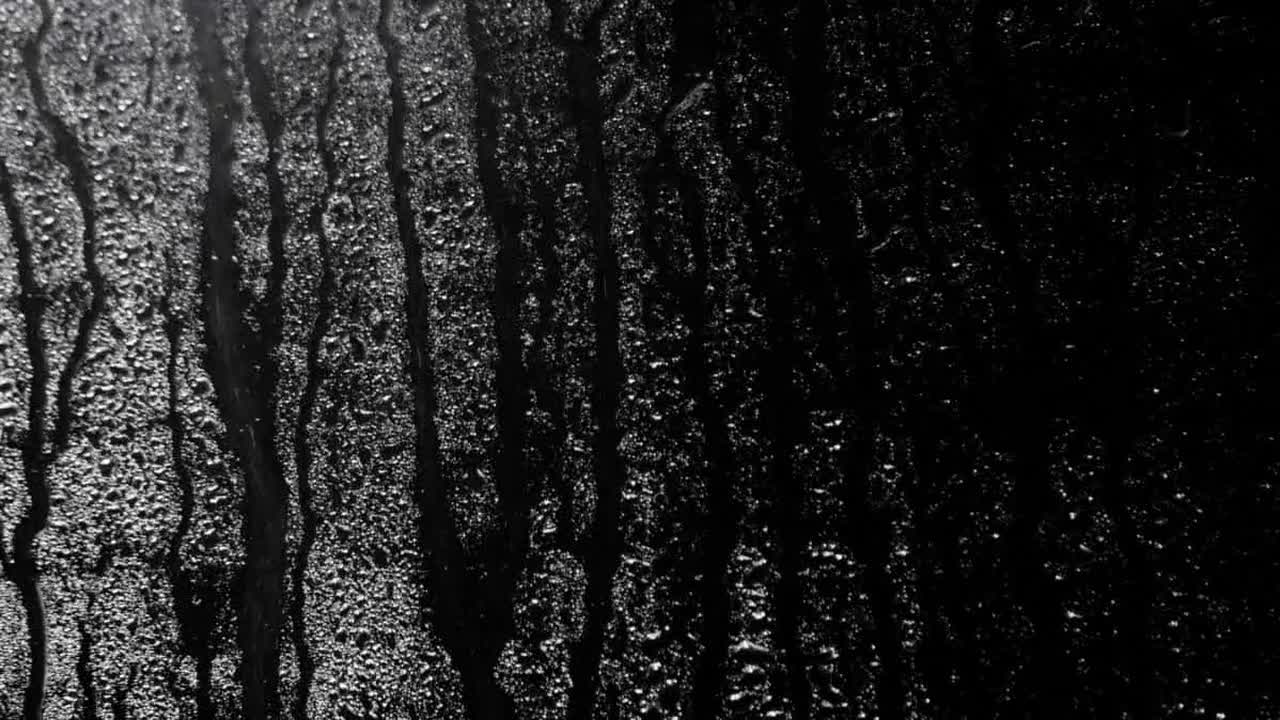 Raindrop On A Black Background Stock Video Motion Array