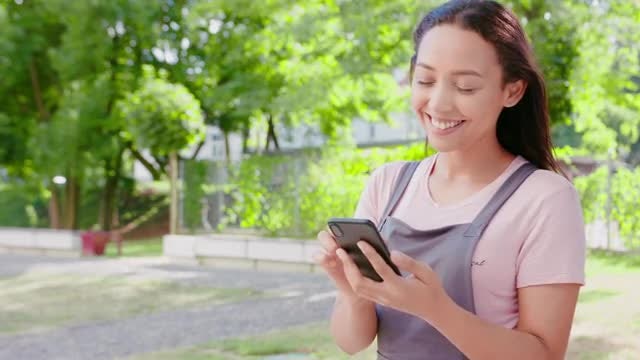 Girl Using Phone: Stock Video