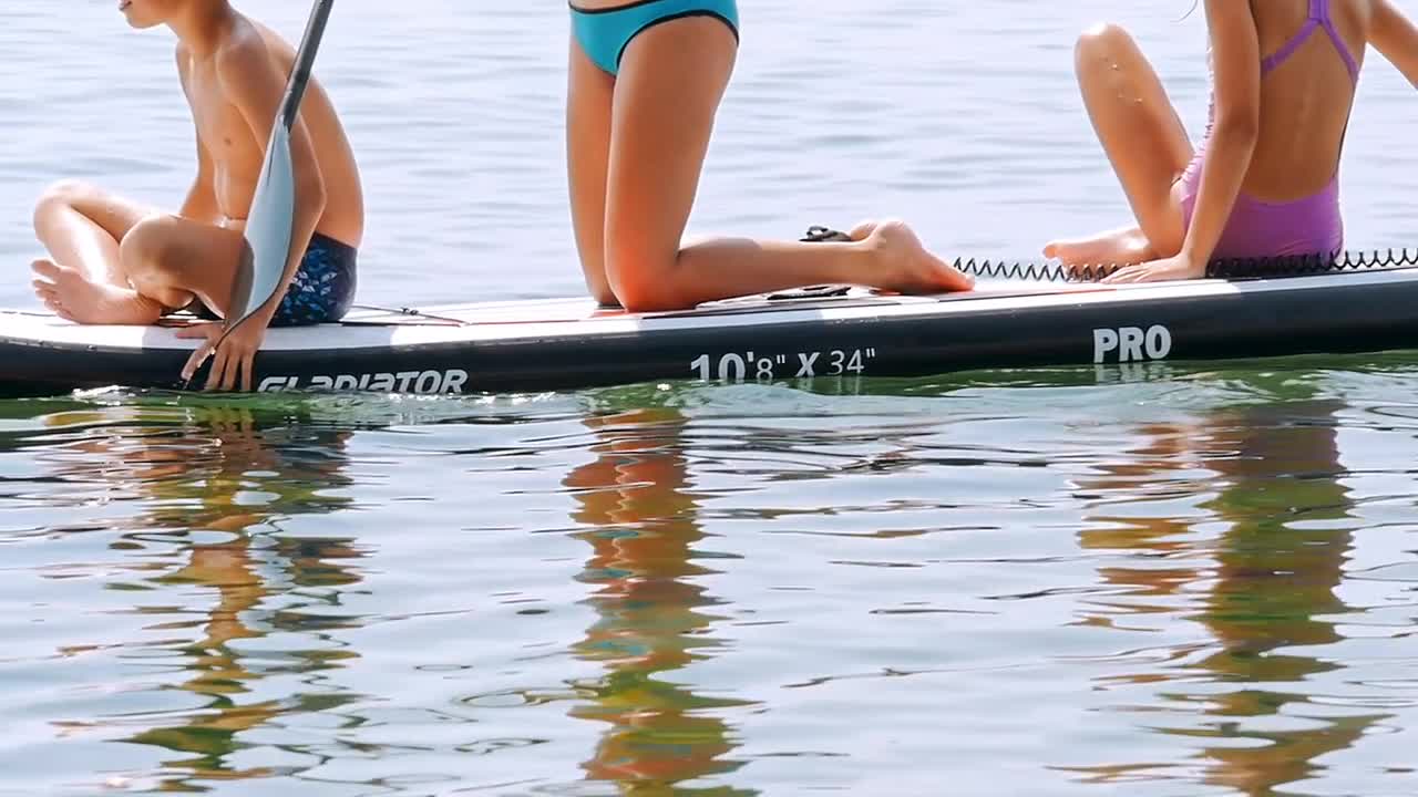 Paddling On The Water Stock Video Motion Array