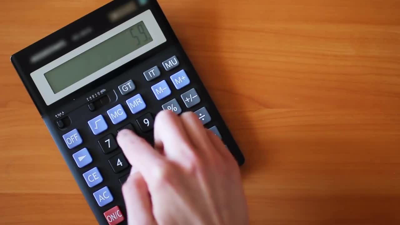 counting-on-calculator-stock-video-motion-array