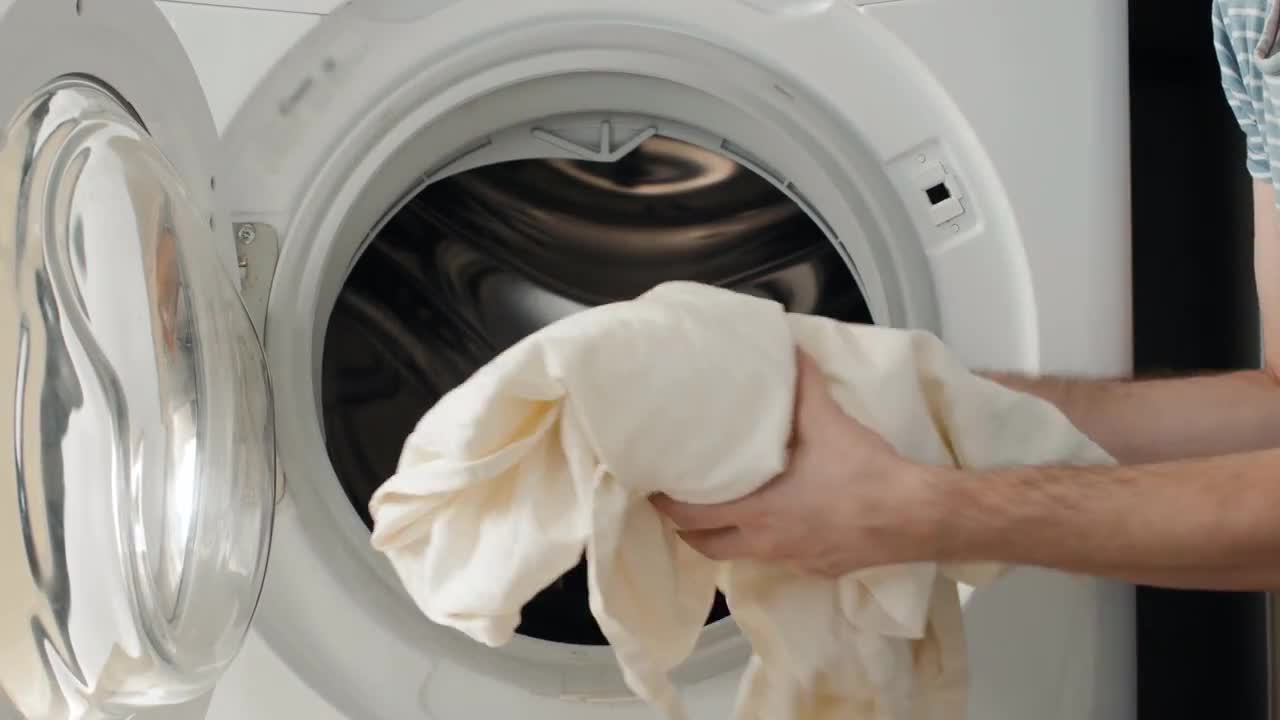 Loading Washing Machine - Stock Video | Motion Array