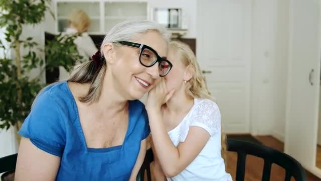 Whispering To Granny: Stock Video