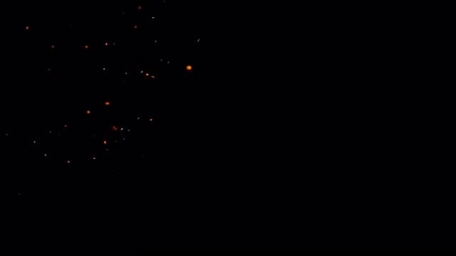 Sparks on black background: Stock Video