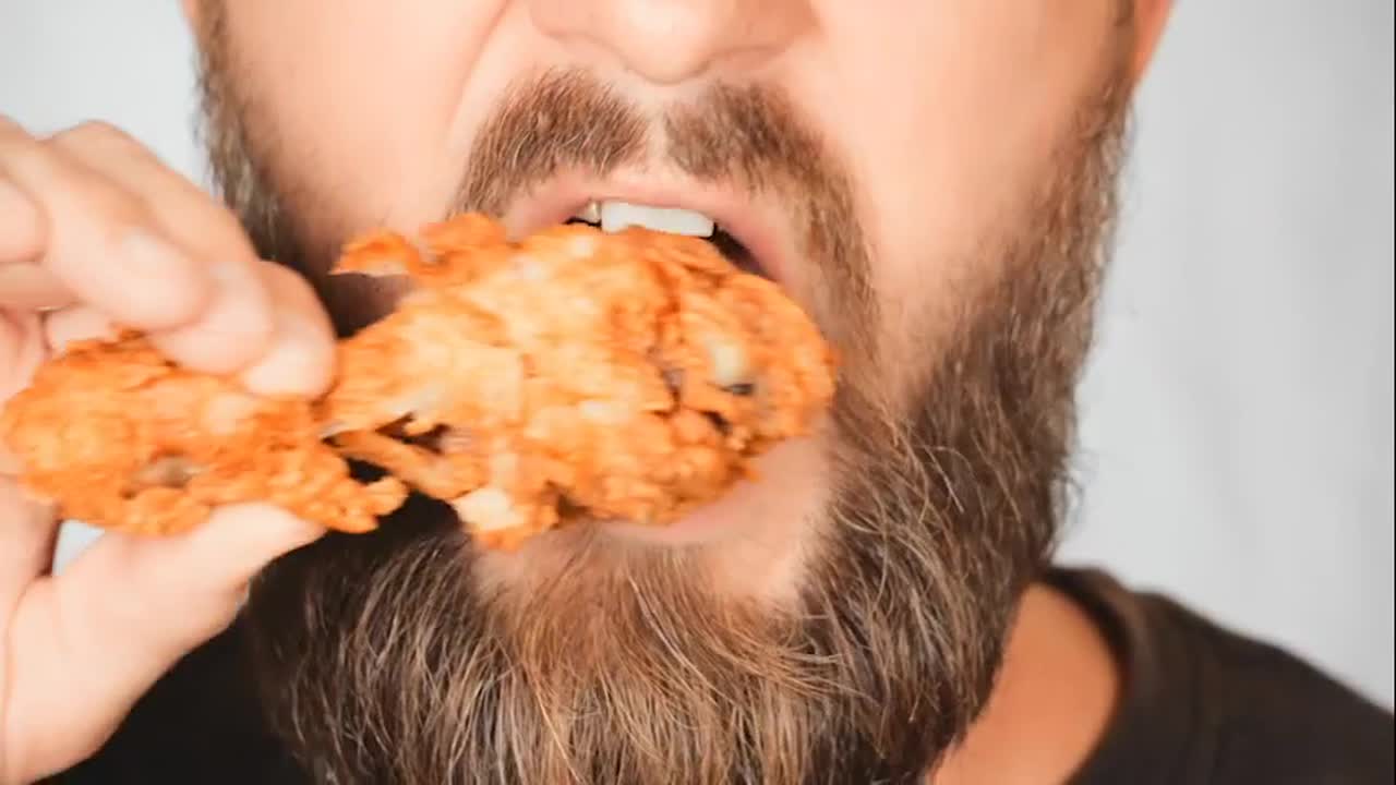 Eating Fried Chicken Stock Video Motion Array