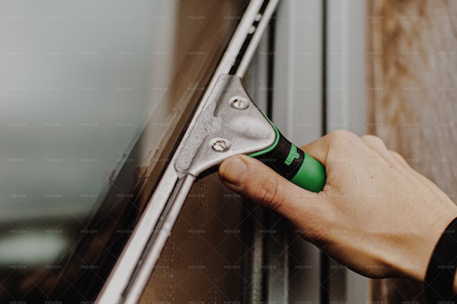 Window Cleaner. squeegee Stock Photo