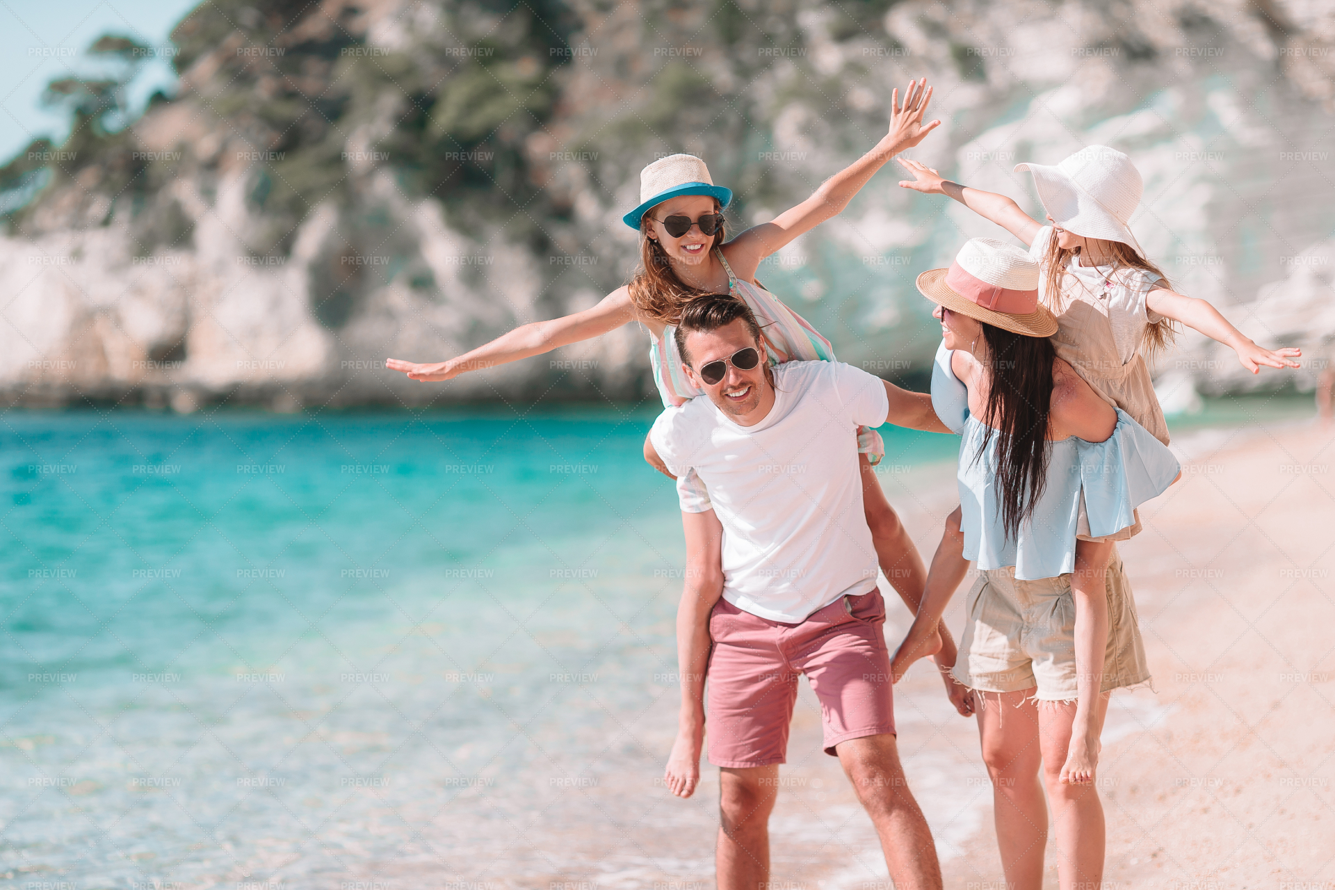 Family Having Fun In The Beach - Stock Photos | Motion Array