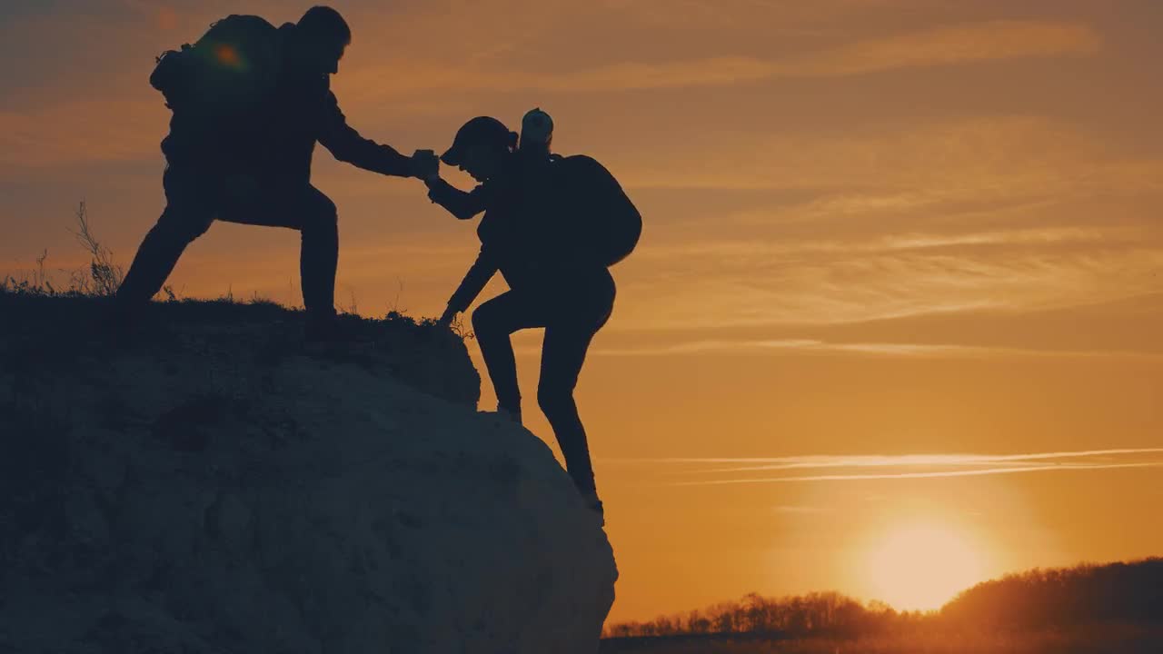 Climbers Helping Each Other Stock Video Motion Array